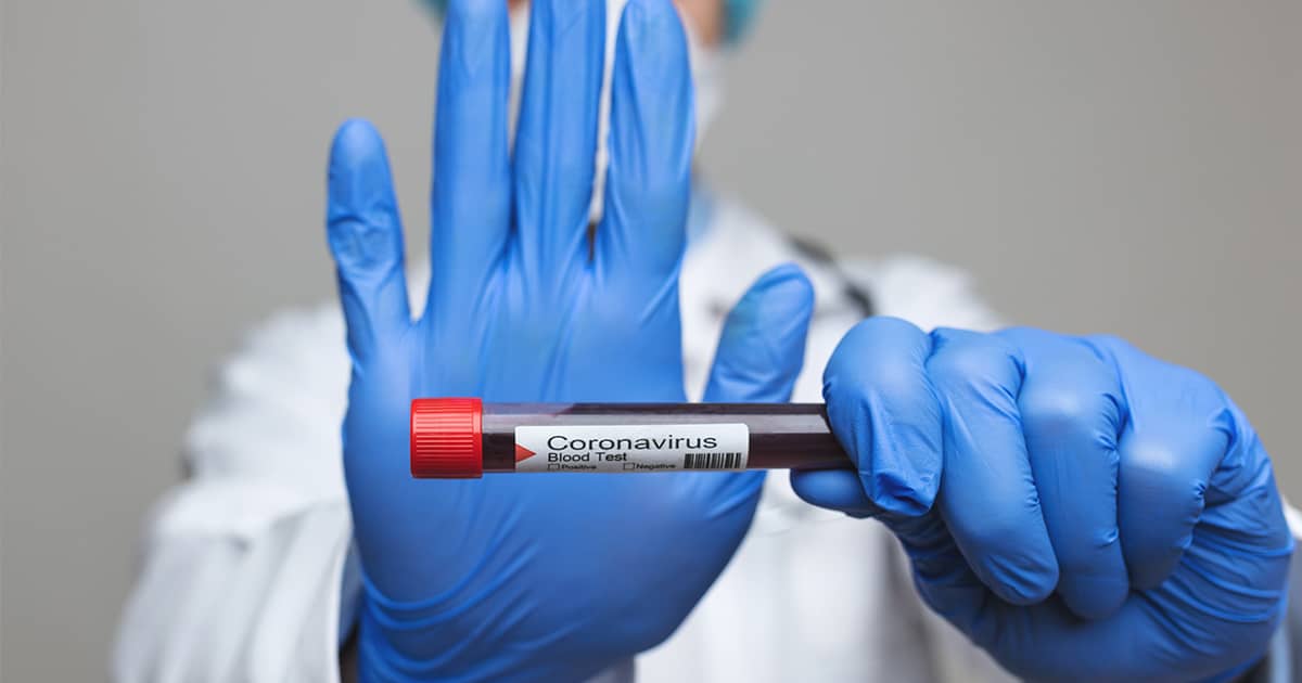 Doctor holding coronavirus sample.